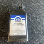 Genuine Mopar Transfer Case Lubricant 68089195AB. Fixed Price $60.00.